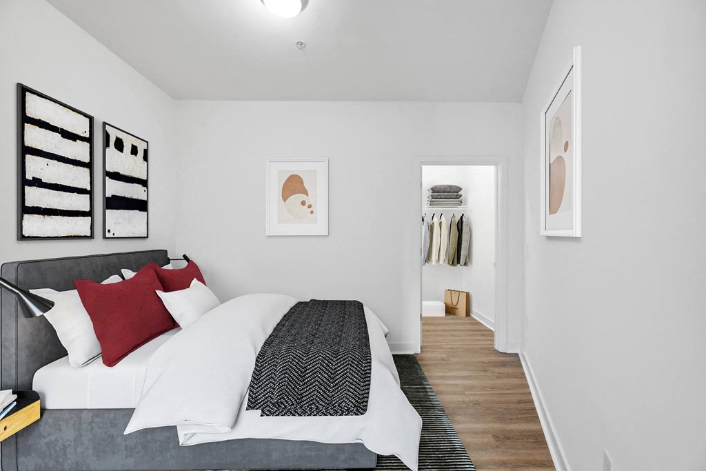 a bedroom with a bed and a closet at Fort Totten Square, Washington