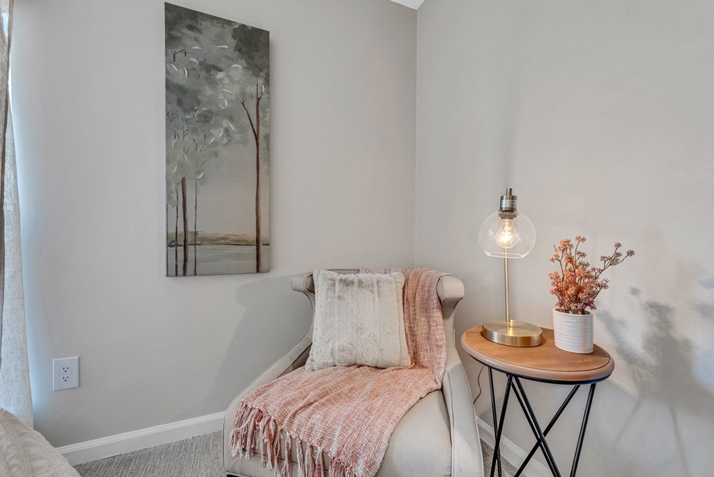 a bedroom with a bed and a nightstand with a lamp at Brampton Moors, Cary, NC, 27513