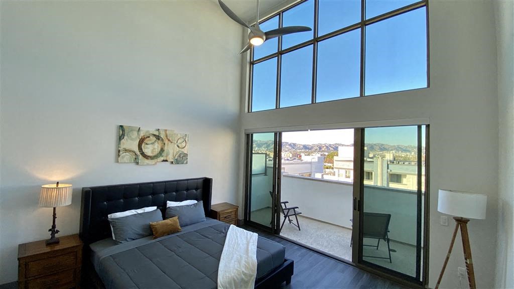 Bedroom With Private Balcony at The Mansfield at Miracle Mile, Los Angeles, California