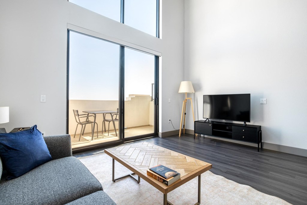Furnished Living Room with Balcony at The Mansfield at Miracle Mile, Los Angeles