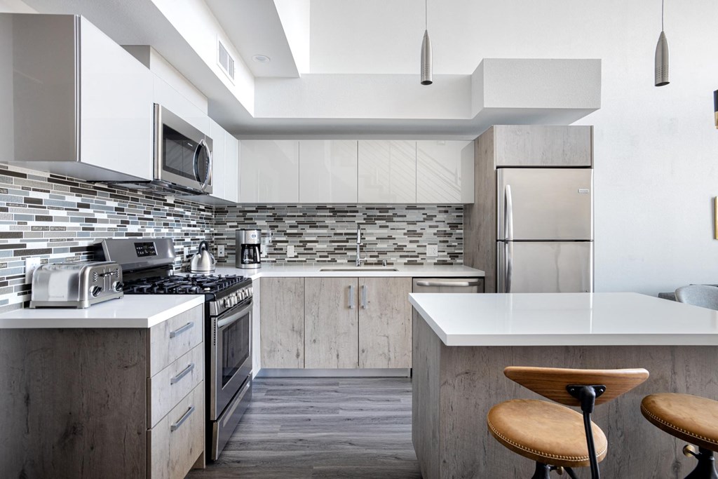 Model Kitchen with Island at The Mansfield at Miracle Mile, Los Angeles, CA