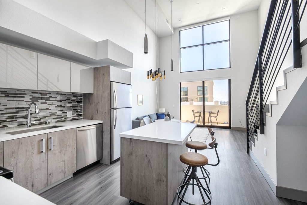 Luxury Kitchen with Balcony Access at The Mansfield at Miracle Mile, California