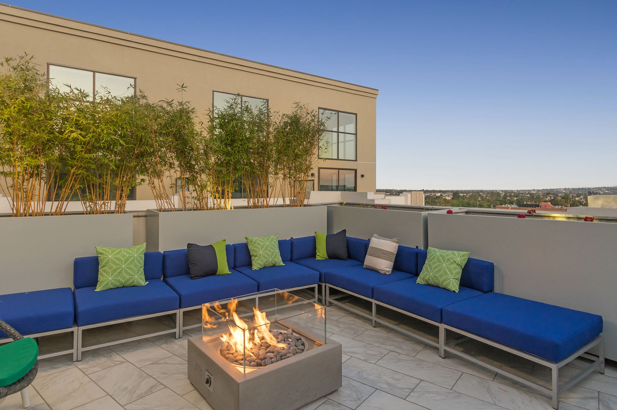 Relaxing Outdoor Lounge Area with Fire Pit at The Mansfield at Miracle Mile, Los Angeles, California