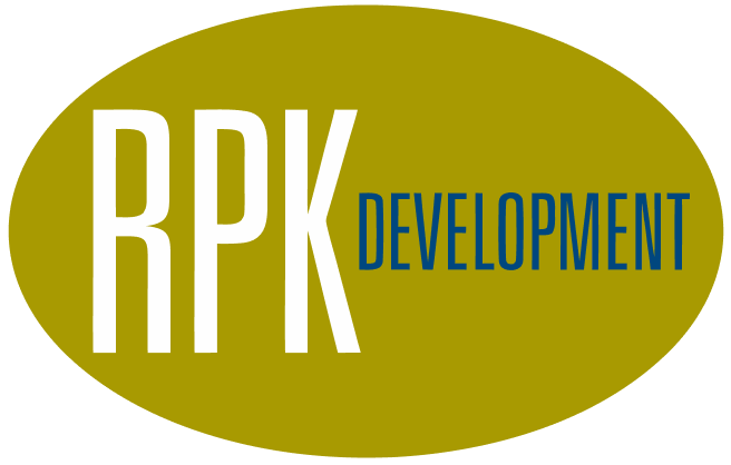 A yellow oval with the letters RPK and the words RPK DEVELOPMENT.