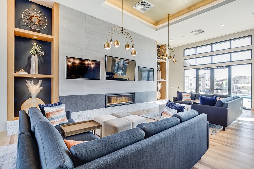 Clubhouse lounge with couches and tv