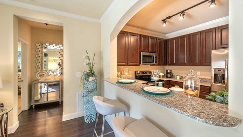 a kitchen with a counter top and a sink