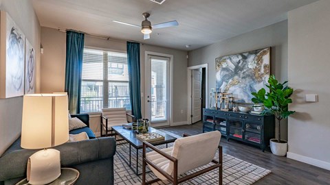 a living room with a couch and a table