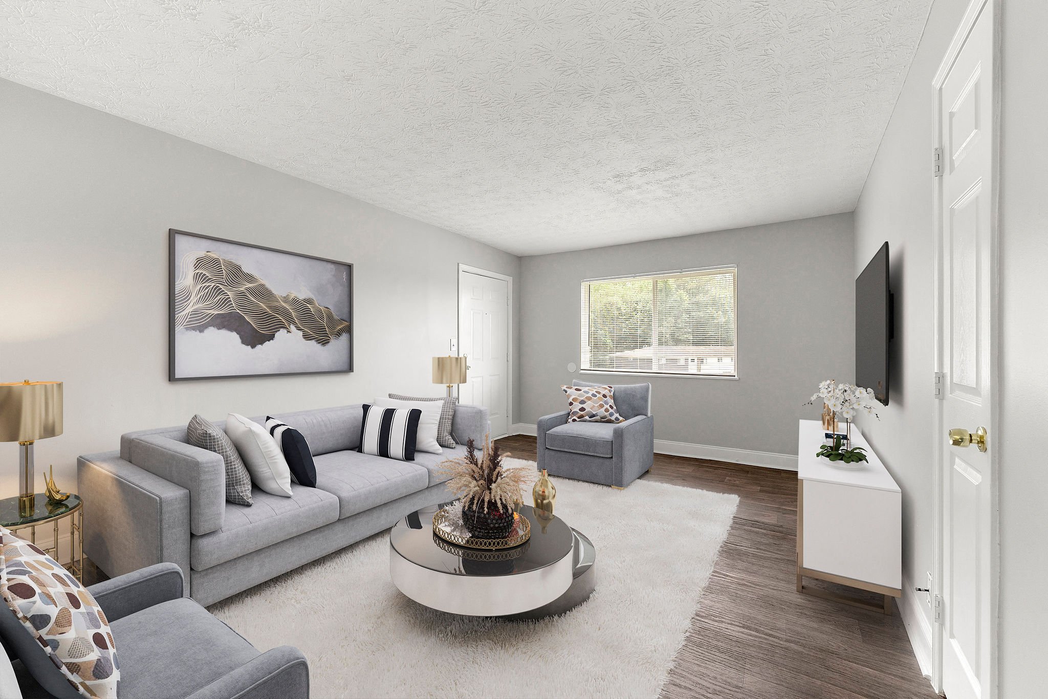 a living room with a couch and a coffee table