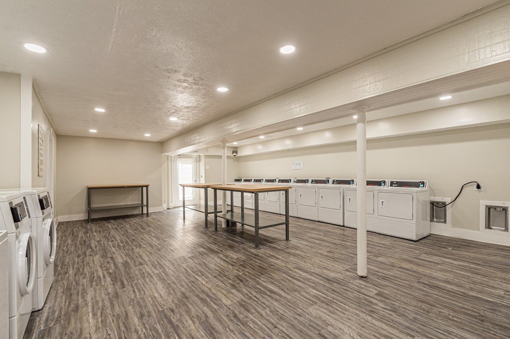 Laundry center with a folding tables at Fields at Peachtree Corners, Norcross, 30092