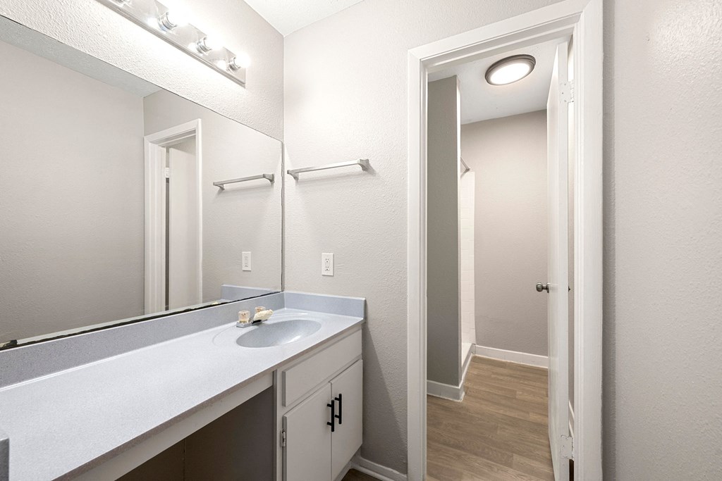 Bathroom with closet Bathroom with closet at 2000 Oasis  Apartments, Atlanta, GA