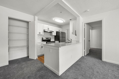 Renovated kitchen with breakfast bar at Eastlake Gardens, Decatur, 30032