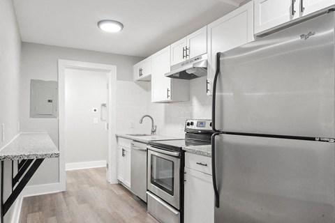 Renovated Kitchen Stainless Steel Appliances Granite Countertops Soft Close Cabinetry