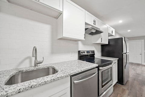 Renovated Kitchen Stainless Steel Appliances Granite Countertops Soft Close Cabinetry