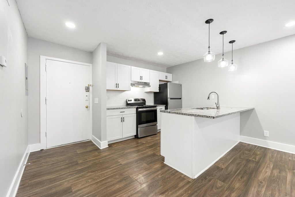 Upgraded Kitchen Granite Countertops Upgraded Kitchen Granite Countertops Stainless Steel Appliances at Balfour Chastain, Sandy Springs, GA