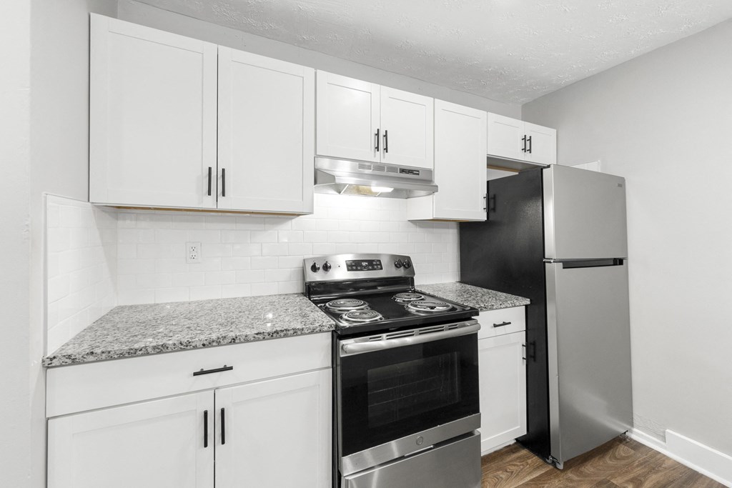 Upgraded Kitchen Granite Countertops Stainless Steel Appliances at Balfour Chastain, Sandy Springs, GA