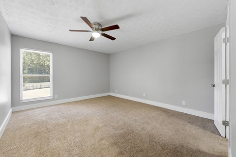 Bedroom with ceiling fan Bedroom with ceiling fan at Balfour Chastain, Sandy Springs, GA