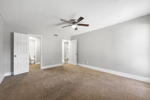 Bedroom with ceiling fan Bedroom with ceiling fan at Balfour Chastain, Sandy Springs, GA