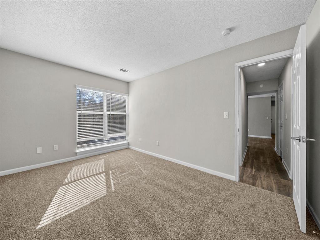 Secondary bedroom with plush carpet.  at Concord Crossing, Georgia, 30082