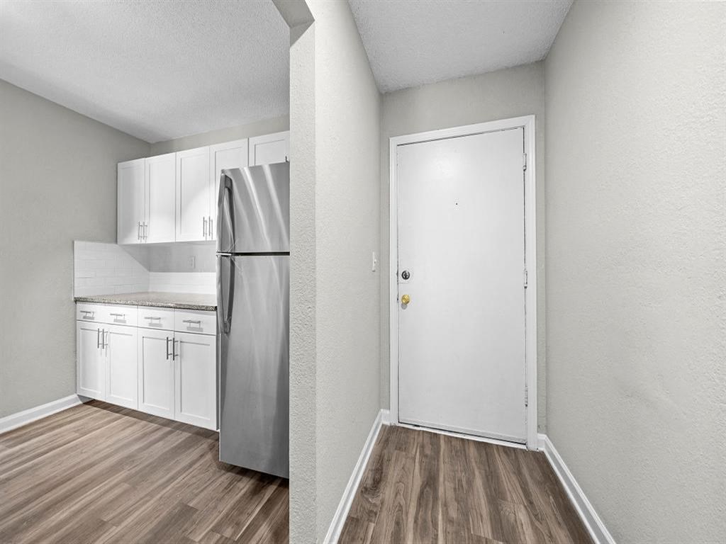 State of the art kitchen with stainless steel appliances, granite countertops, soft-close cabinetry.  at Concord Crossing, Georgia, 30082