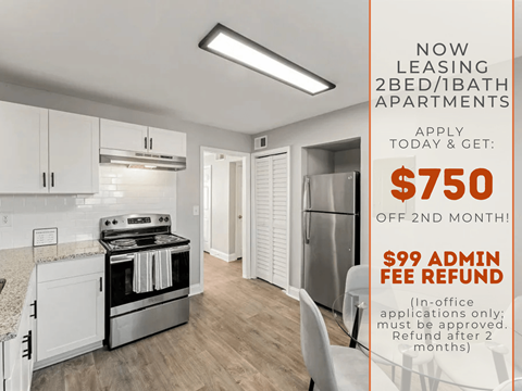 A kitchen area of a 2 bedroom apartment with a promotion for leasing.