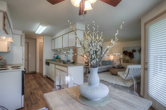 Living Space with a Dining Room Table and Plank Flooring, Boasting a view into both the kitchen and living areas at Parkside Apartments, Gresham, 97080