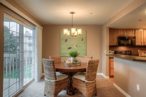 Living Area With Fireplace at Canterbury Apartments, Puyallup, 98373