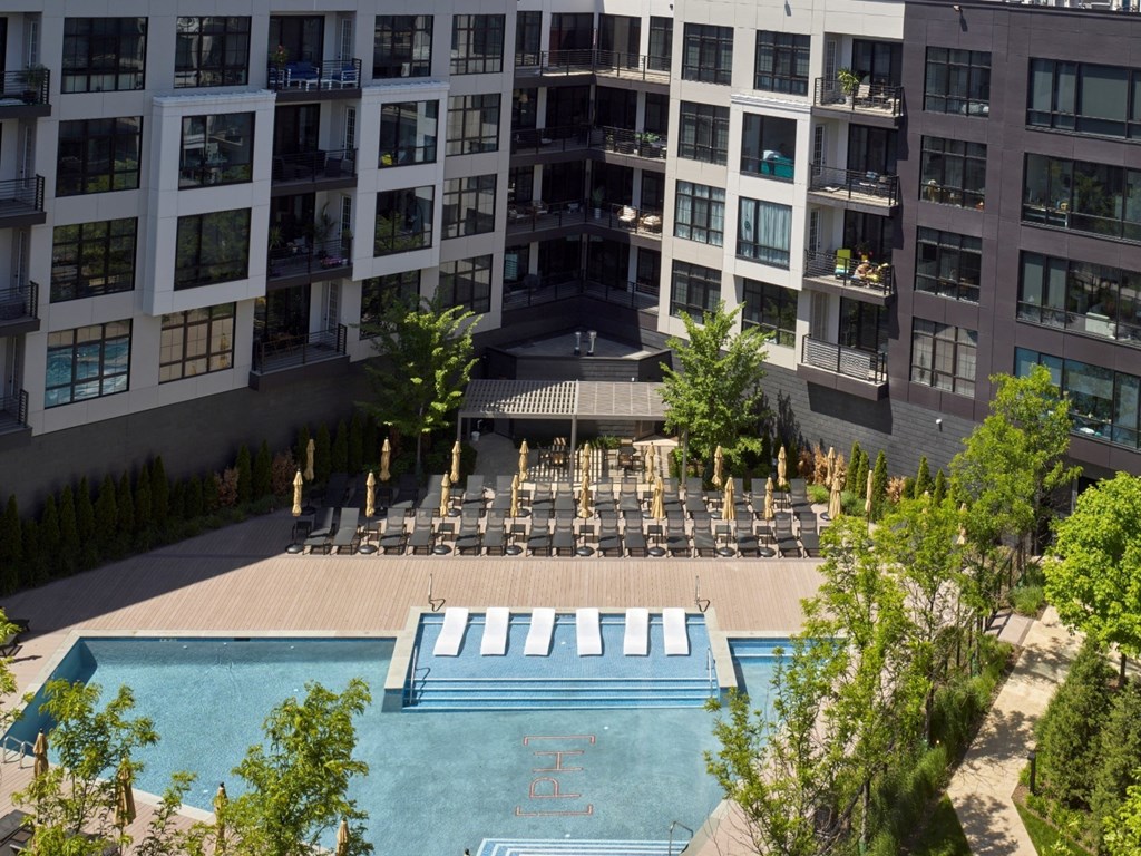 pool, resort, sun deck, tanning, outdoors, swimming, lounge chairs