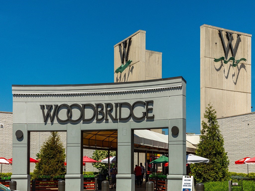 the facade of a building with a woodbridge sign