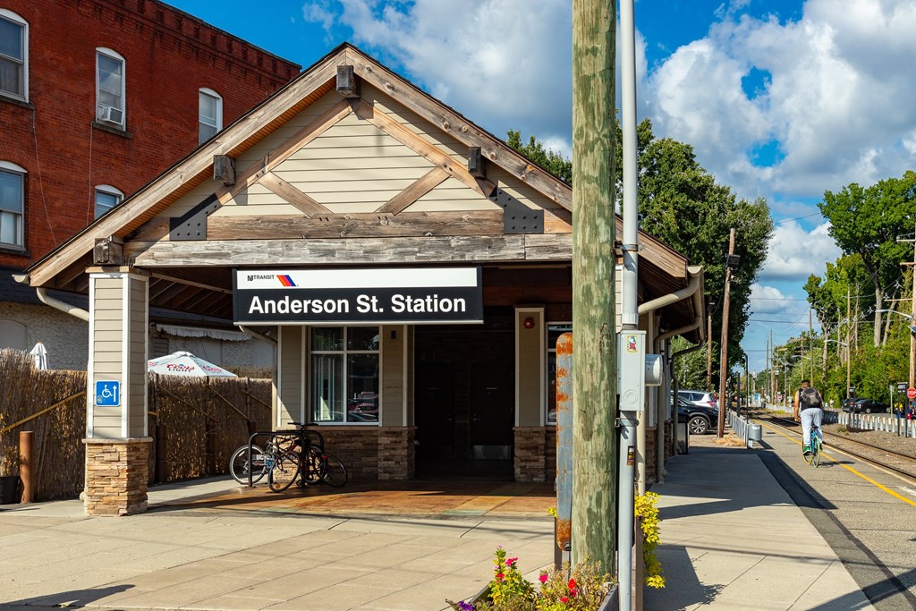 A small building with a sign that says Anderson St. Station.