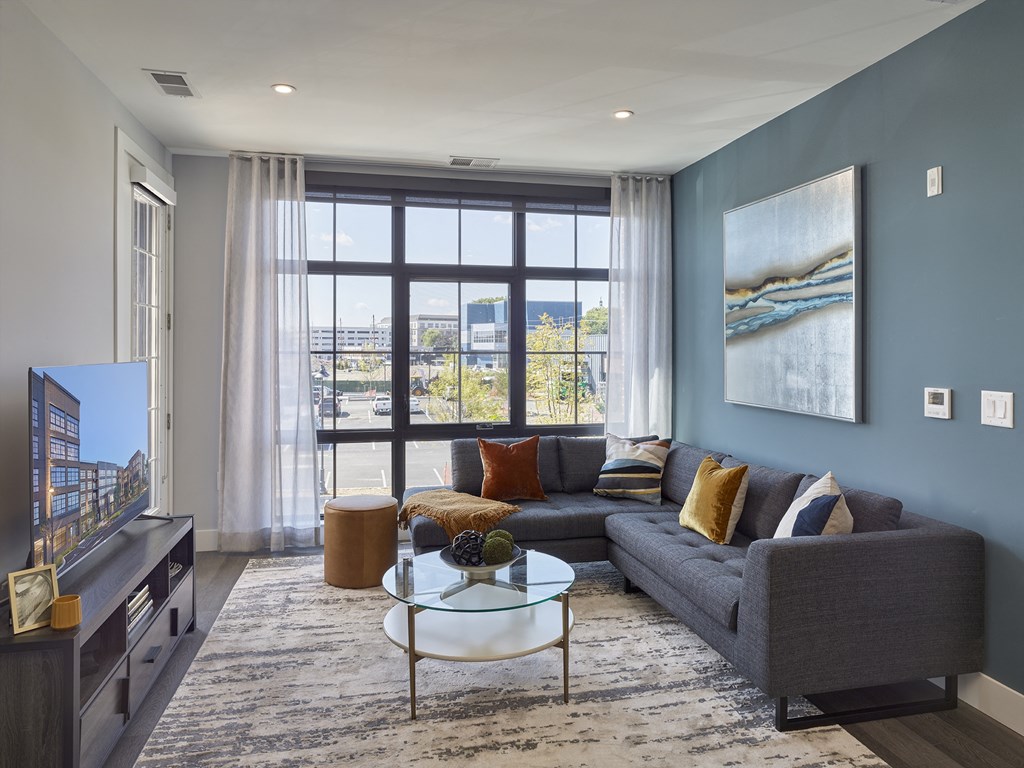 floor to ceiling windows, private balcony, hardwood floors