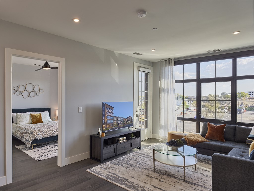 open floorplan, hardwood floors, private balcony, large master suite