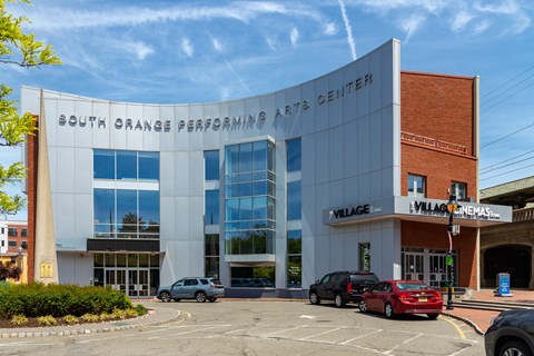 A building with the words South Orange Performing Arts Center on it.