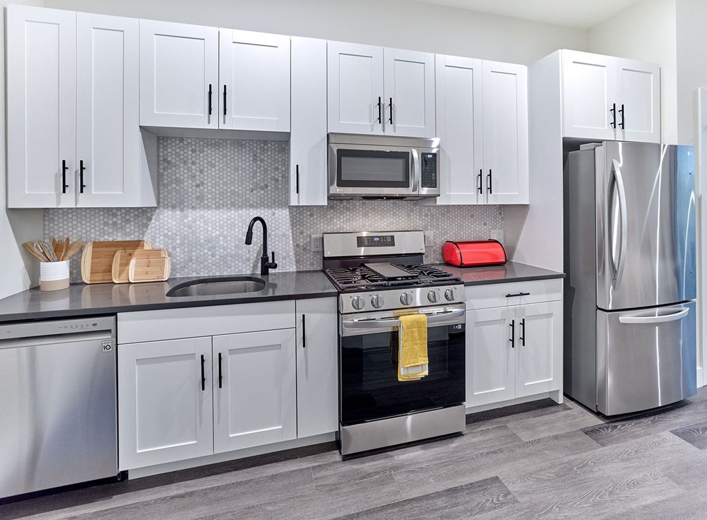 spacious studio, full size appliances, custom built in