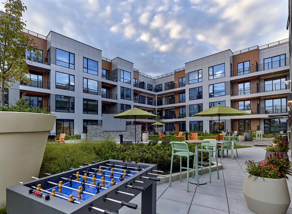 outdoor game tables, seating, outdoor bar, grills