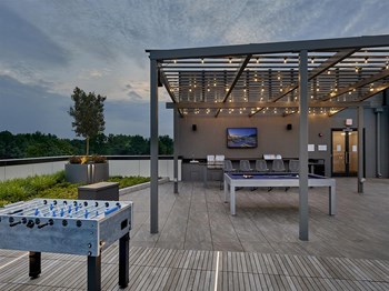 Amenities Roof Terrace with Gaming Tables and Bar - Photo Gallery 6