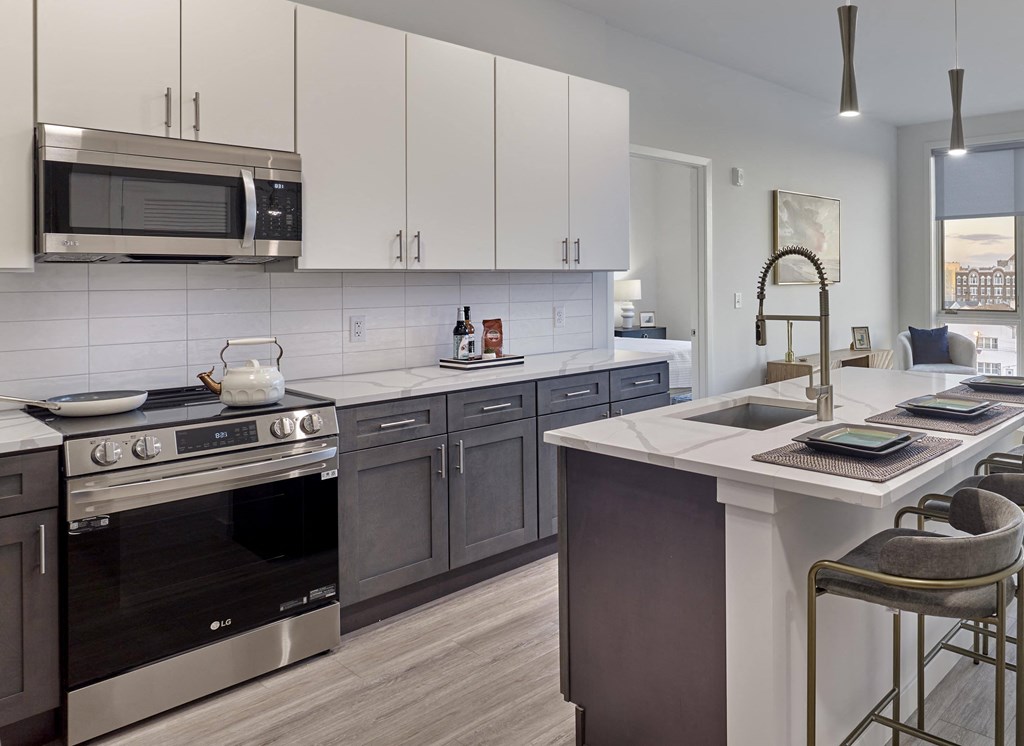 Contemporary kitchen with large countertops and stylish design at Ora in Hackensack, NJ
