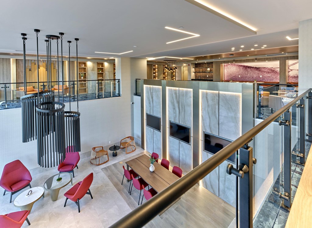 Spacious indoor lobby with large windows and stylish seating at Ora in Hackensack, NJ