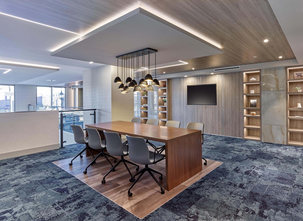 Upscale resident common area with bar seating and open layout at Ora luxury apartments in Hackensack, NJ