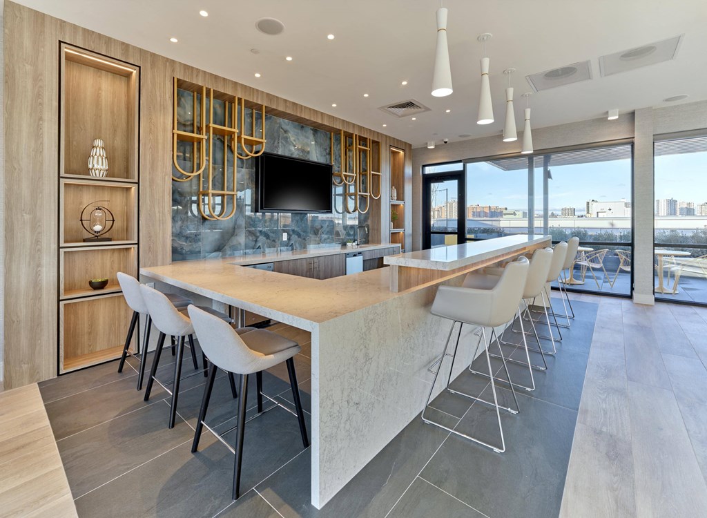 Open-concept dining area with stylish decor and natural light at Ora in Hackensack, NJ