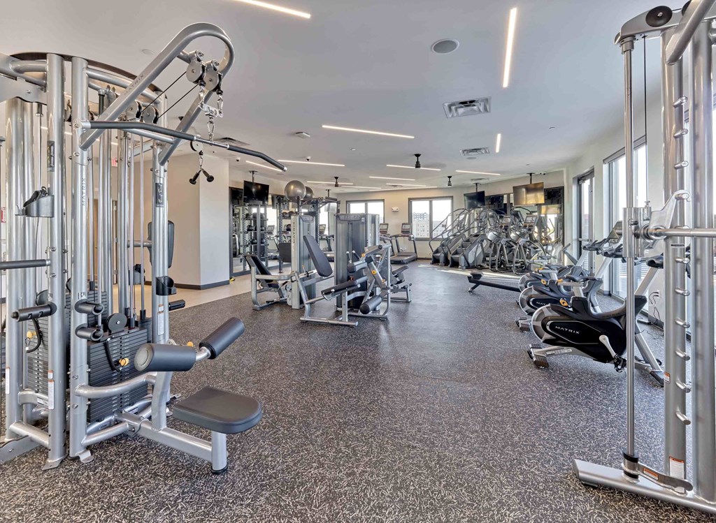 Amenities State-of-the-art fitness center with premium exercise equipment at Ora luxury apartments in Hackensack, NJ