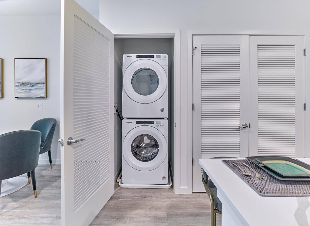 In-unit washer and dryer in a modern laundry space at Ora luxury apartments in Hackensack, NJ