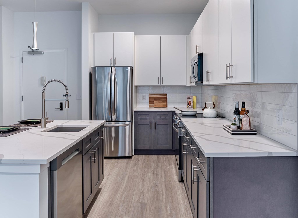Bright kitchen with large countertops and a functional open layout at Ora in Hackensack, NJ