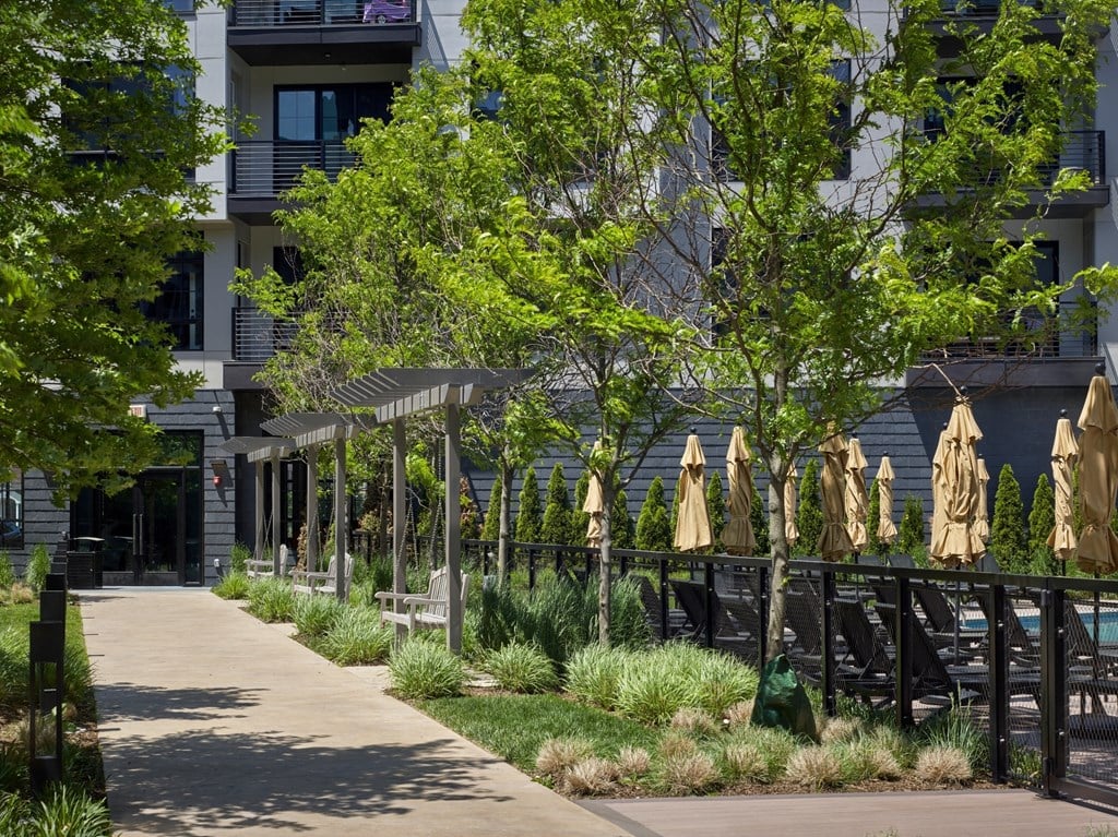 outdoors, courtyard, outdoor lounge, trees, landscaping