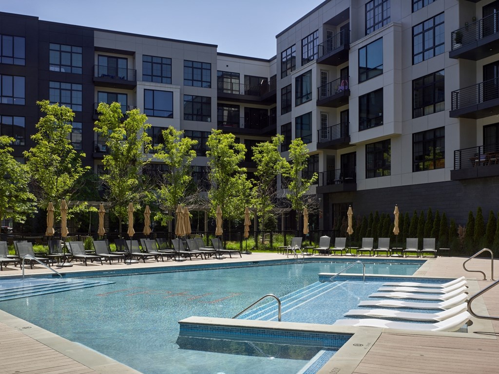 pool, resort, sun deck, tanning, outdoors, swimming, lounge chairs