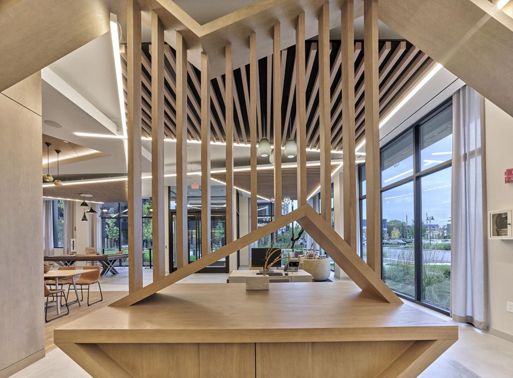 Modern resident lounge with a game room at Print House, Hackensack, NJ