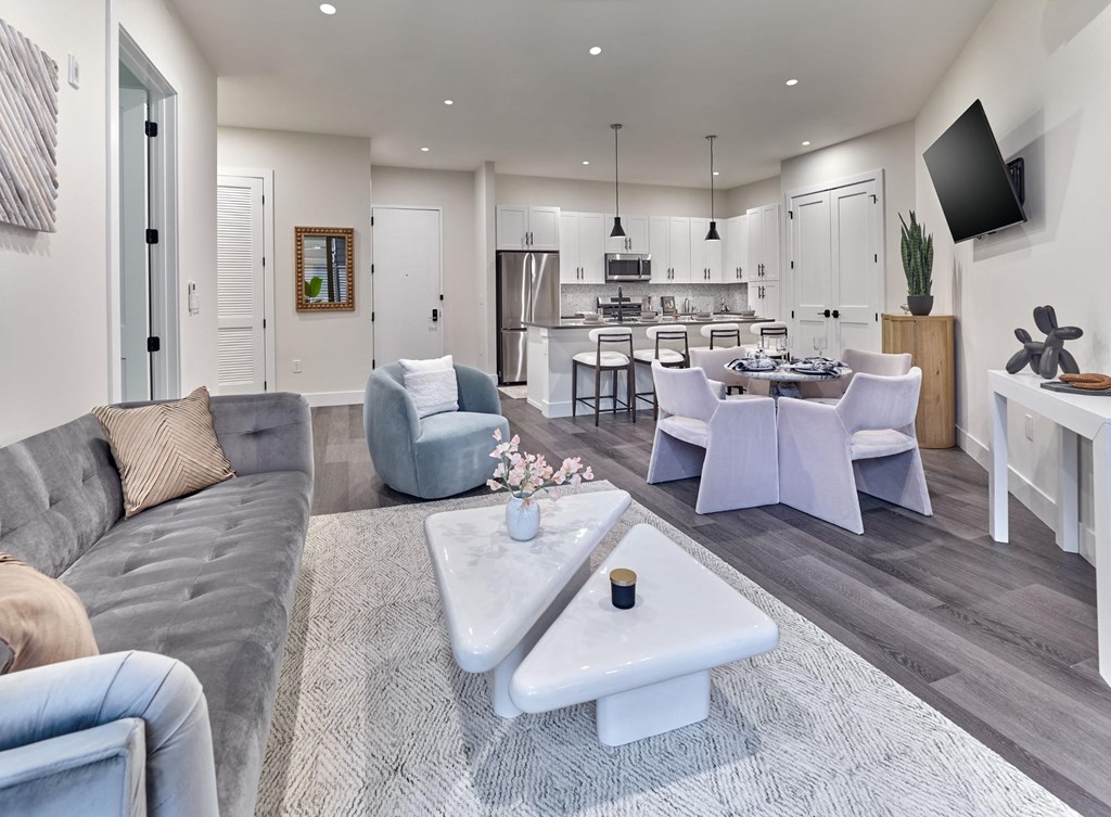 Open-concept living and dining area in a Print House Apartments, Hackensack, NJ