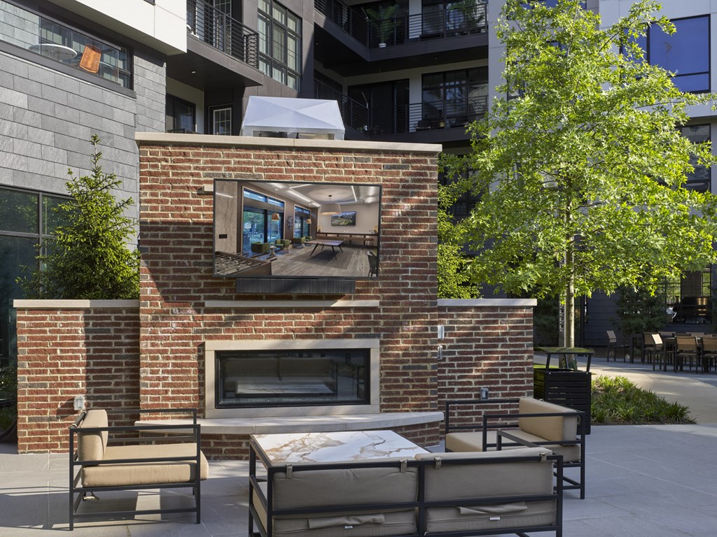 outdoor tv, fireplace, outdoor seating, courtyard, outdoor lounge, chairs, lounge chairs