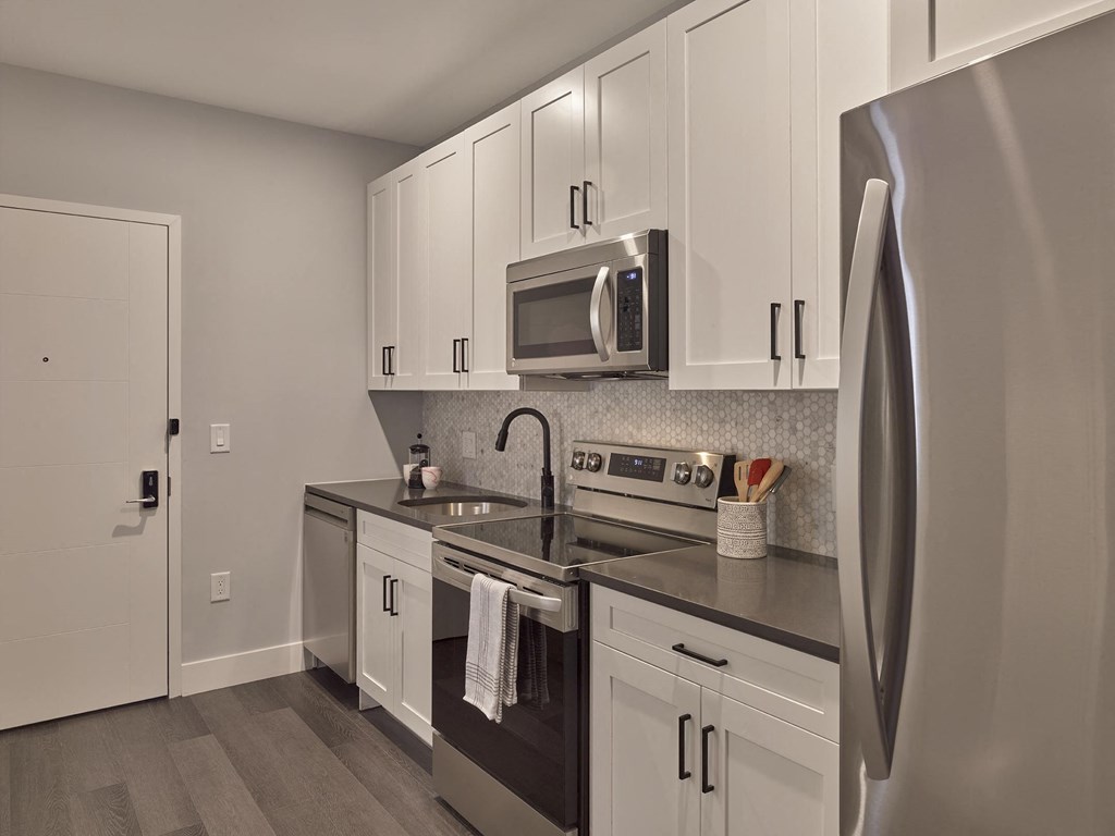 studio kitchen, full size appliances, large studio home