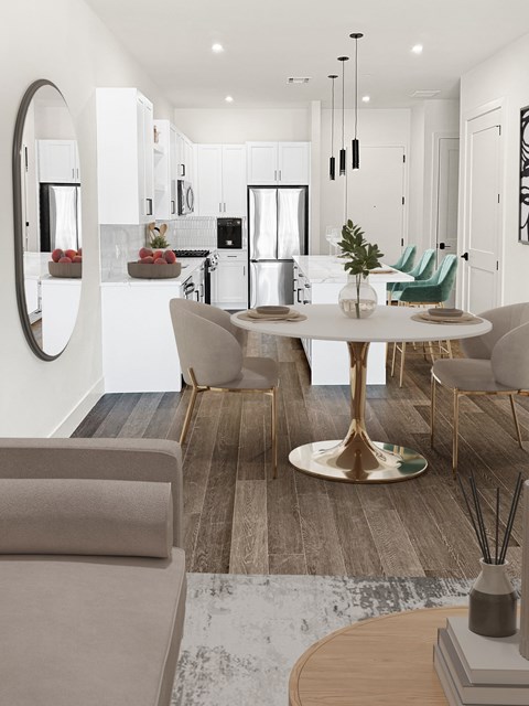A modern dining room with a round table and chairs.