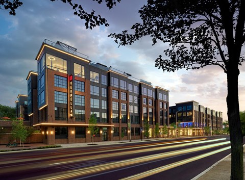 a rendering of a large building on a city street